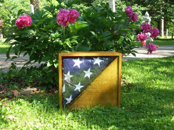 Golden Oak Flag Display Case with ashes