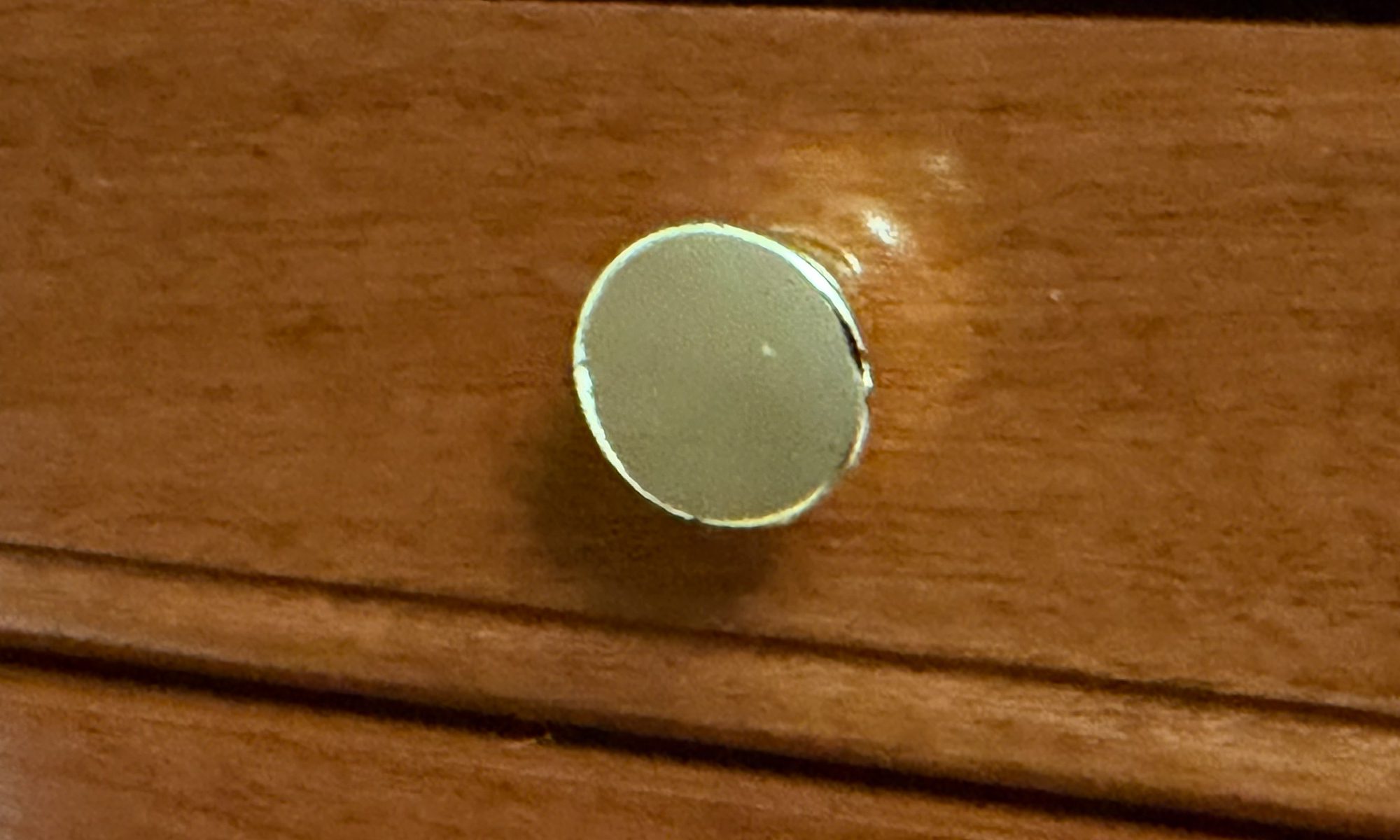 Custom Gerstner brass plated drawer knob on a wood tool chest