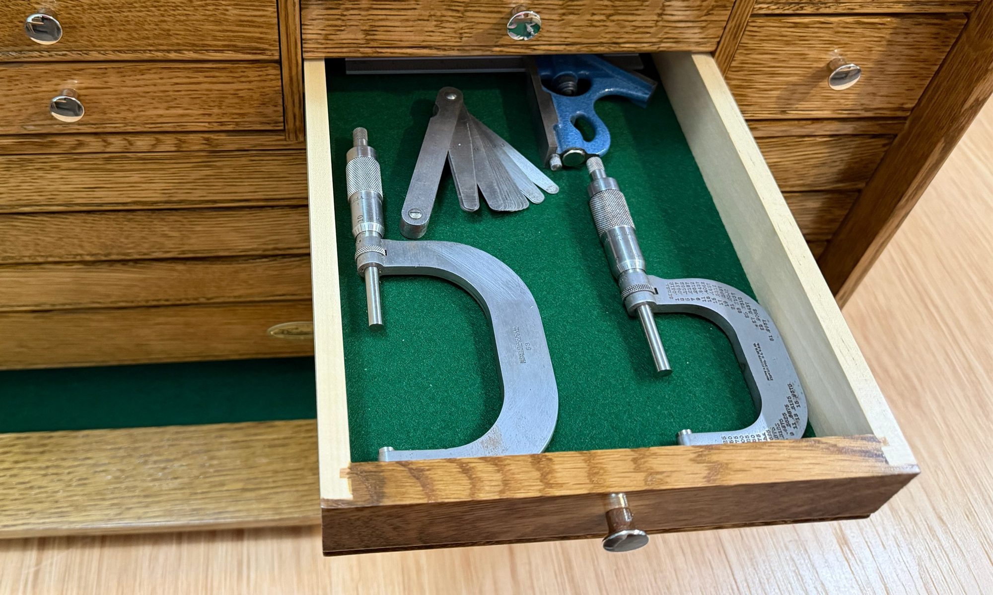 Felt-lined wooden tool chest interior protecting tools from moisture