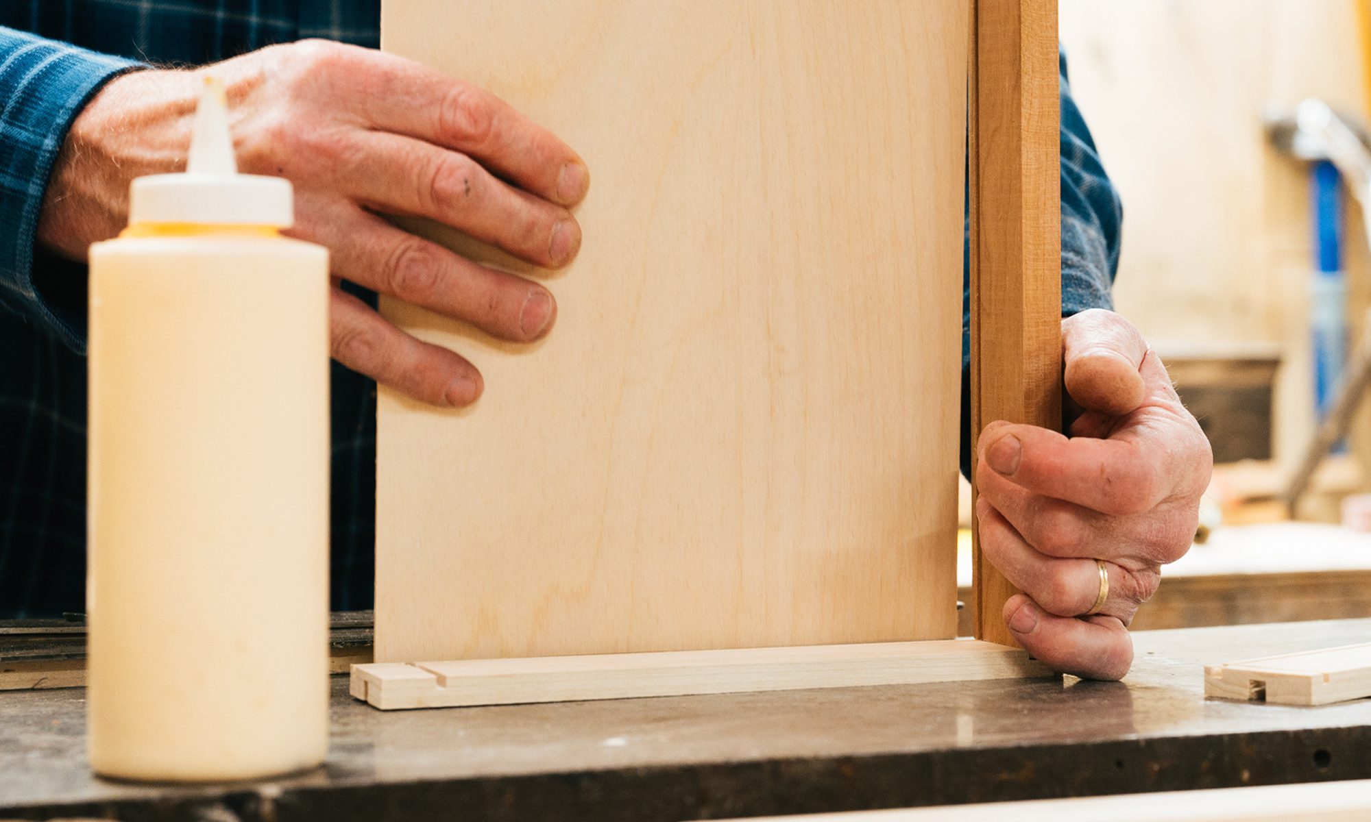 Hand assembling wood tool chest drawer